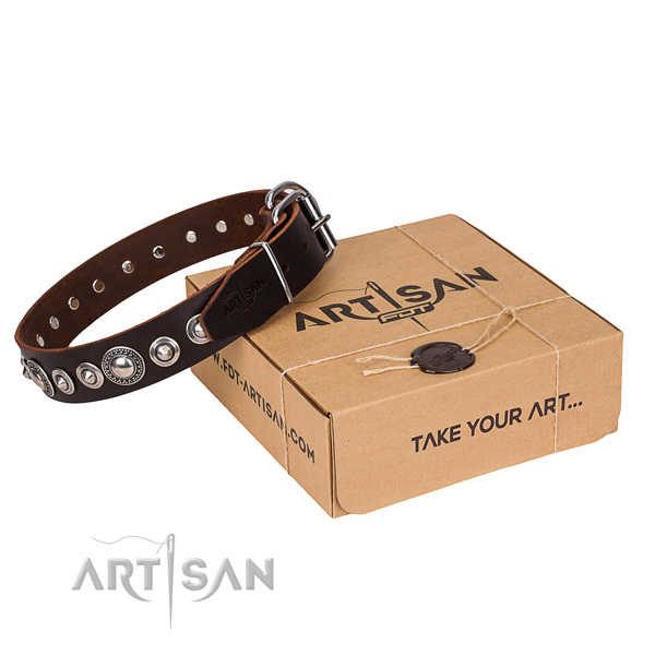 Genuine leather dog collar made of gentle to touch material with rust-proof hardware